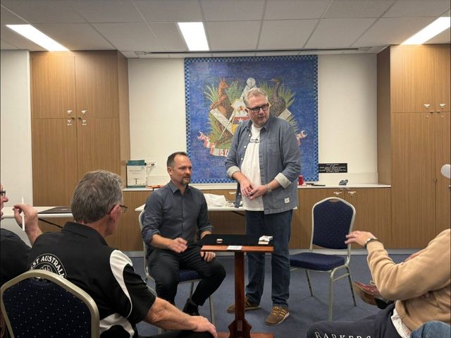 Chris Congreave explaining a routine during the August 2025 lecture