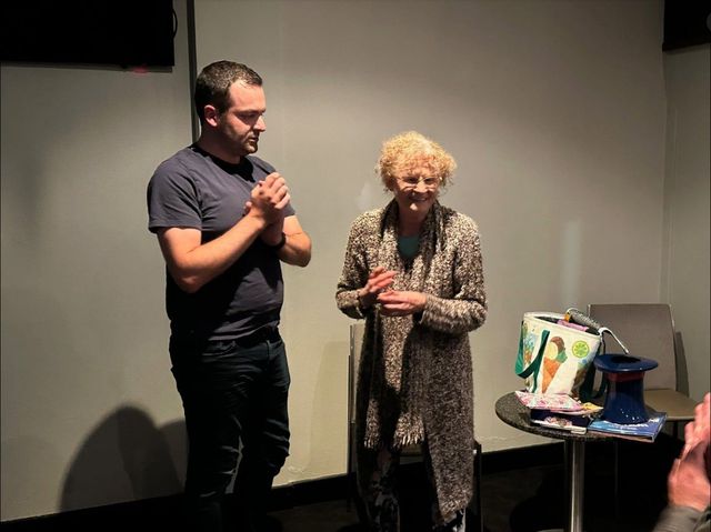 Member presenting with a woman at Oct 2023 meeting (unnamed)