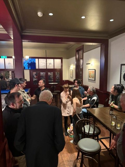 Members and guests mingling at the Belgian Beer Café on AGM night, May 2026